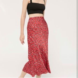 Urban Outfitters Normani Bias leopard midi skirt